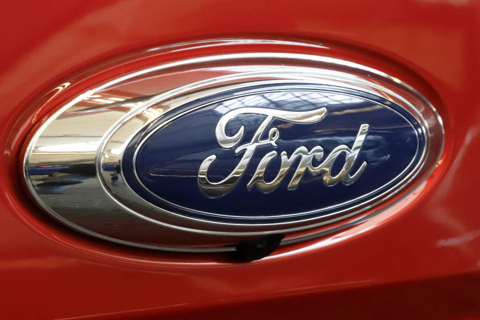 FILE- In this Feb. 14, 2019, file photo this is the Ford logo on a 2019 Ford Ranger 2019 Supercrew 4x4 on display at the 2019 Pittsburgh International Auto Show in Pittsburgh. Ford says it has launched an investigation into whether a flawed mathematical model caused it to overstate gas mileage and understate pollution from a wide range of vehicles. The company says a group of employees reported possible problems with the model in September. So it has hired an outside firm to test the 2019 Ford Ranger. (AP Photo/Gene J. Puskar, File)