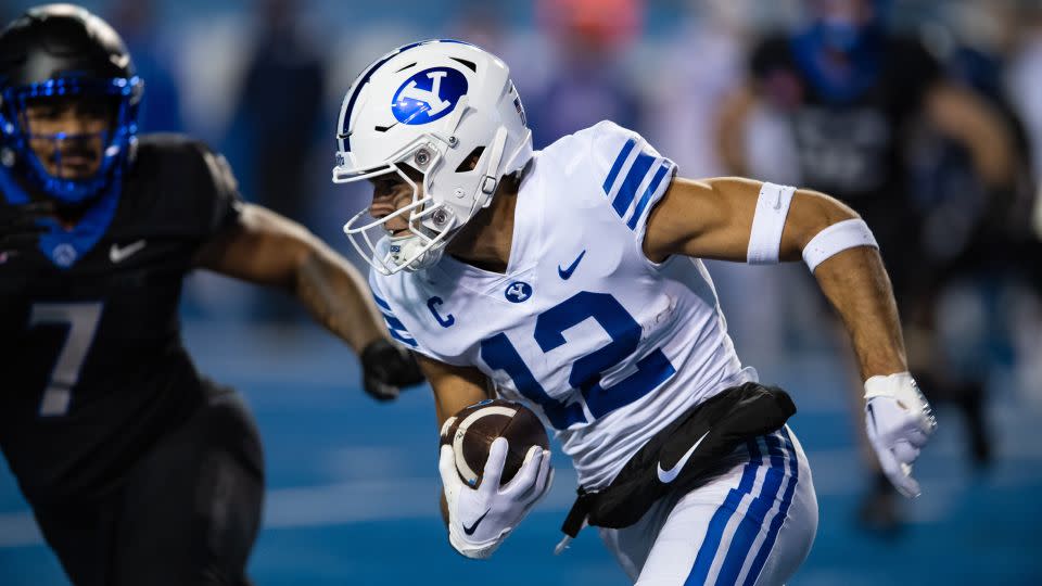 On November 5, 2022, Nacua carried the ball against the Boise State Broncos at BYU.  -Tyler Ingham/Icon Sportswire/Getty Images