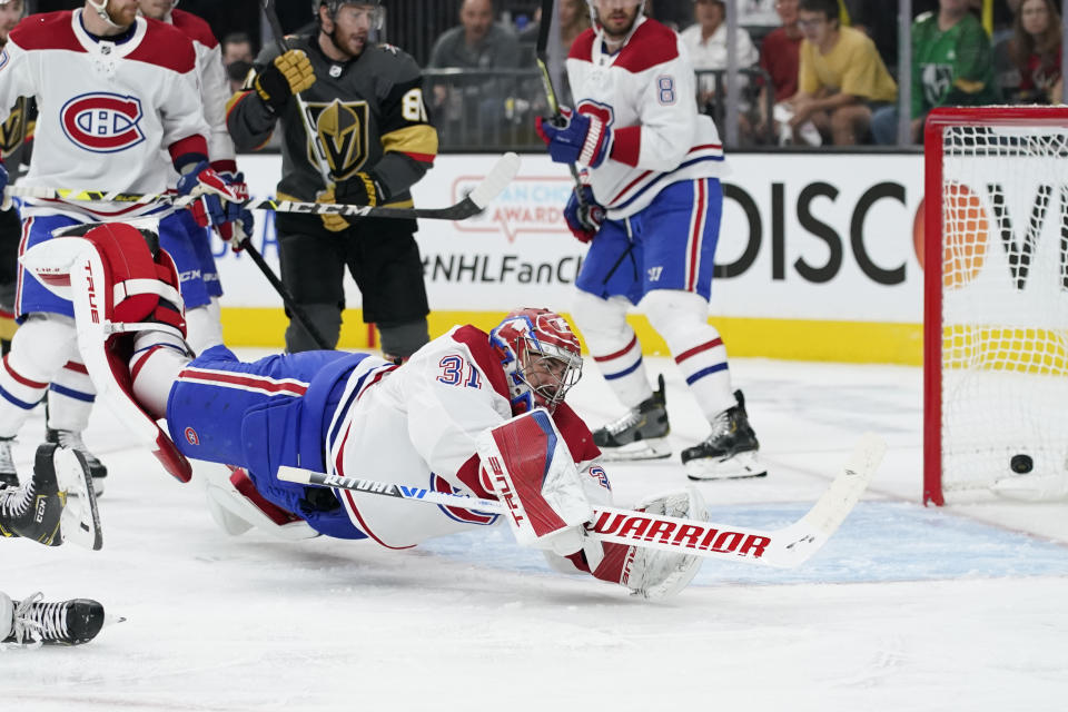 Montreal Canadiens goaltender Carey Price (31) is scored on by Vegas Golden Knights defenseman Alec Martinez, not pictured, during the second period in Game 1 of an NHL hockey Stanley Cup semifinal playoff series Monday, June 14, 2021, in Las Vegas. (AP Photo/John Locher)