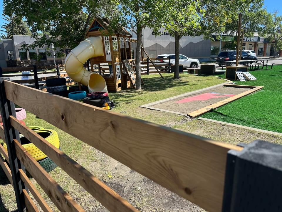 A small playground and sandbox are part of the park installation in the parking lot by the Christian Life Assembly church off Richmond Road.