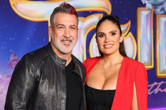 <p>Leon Bennett/Getty </p> Joey Fatone and Izabel Araujo in 2023