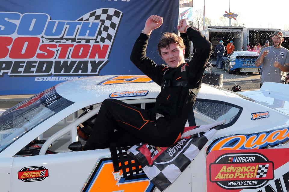 Carter Langley celebrates as he climbs out of his car in Victory Lane after winning the second of the two Sentara Healthcare Late Model Stock Car Division races that headlined the season-opening event on March 18 at South Boston Speedway. (Joe Chandler/South Boston Speedway)