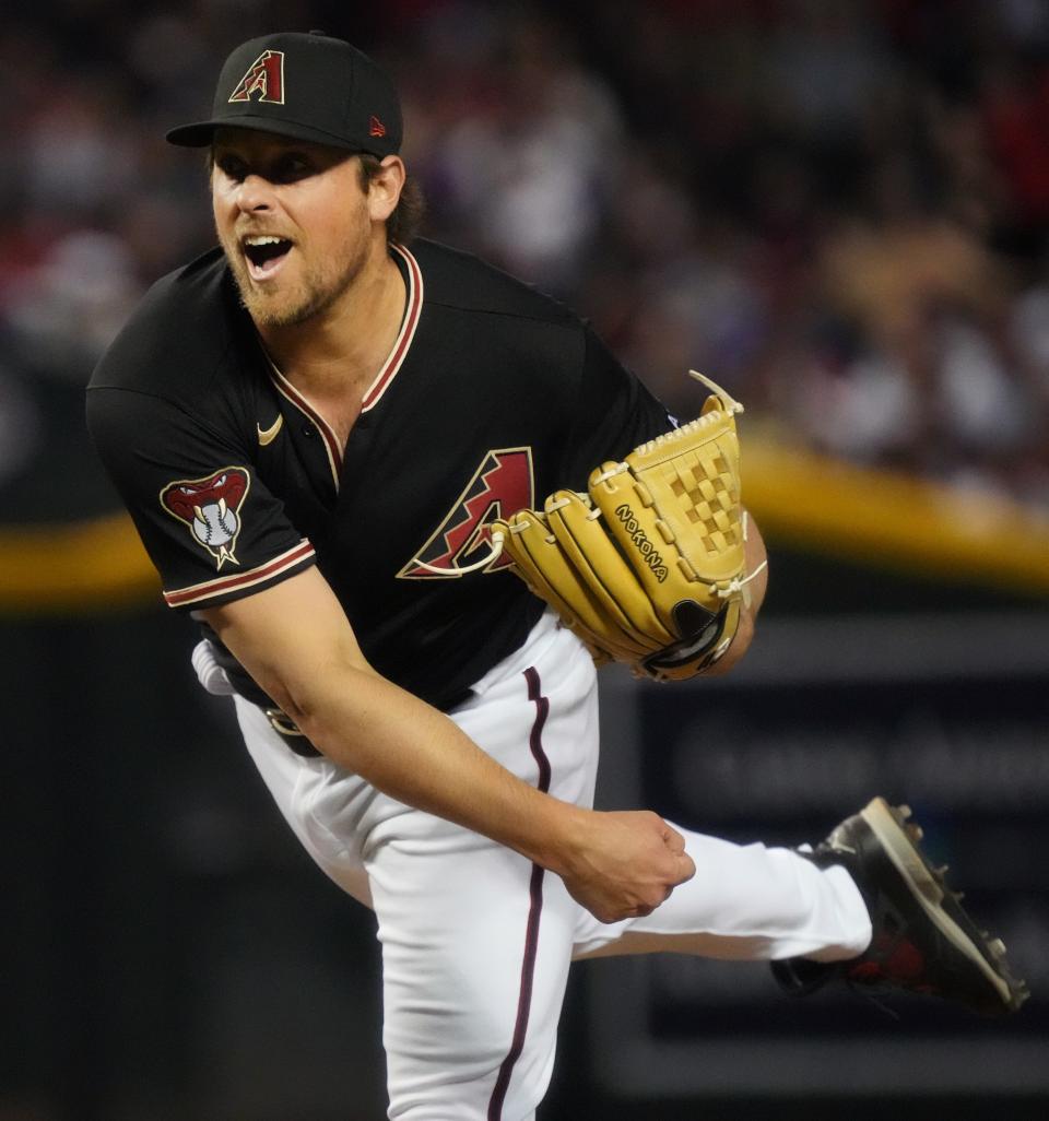 Arizona Diamondbacks' Kevin Ginkel (37) pitches against the Los Angeles Dodgers on Opening Day at Chase Field, April 6, 2023.