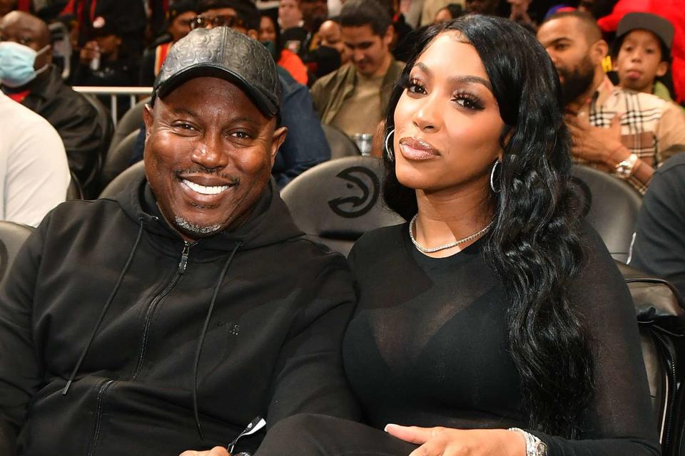 <p>Paras Griffin/Getty Images</p> Simon Guobadia and Porsha Williams attend the game between the Milwaukee Bucks and the Atlanta Hawks at State Farm Arena