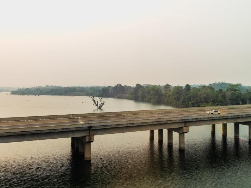 A highway across a river in Laos.