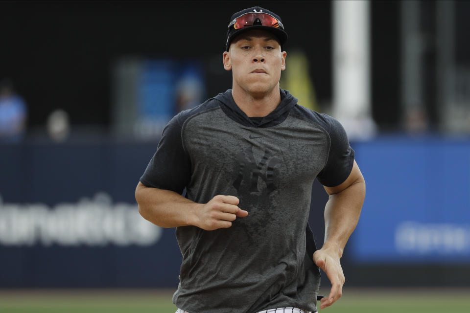 New York Yankees' Aaron Judge runs during a spring training baseball workout Thursday, Feb. 20, 2020, in Tampa, Fla. (AP Photo/Frank Franklin II)