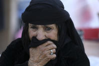 <p>An earthquake survivor weeps in front of her house in a compound which was built under the Mehr state-owned program, in Sarpol-e-Zahab in western Iran, Nov. 14, 2017.(Photo: Vahid Salemi/AP) </p>