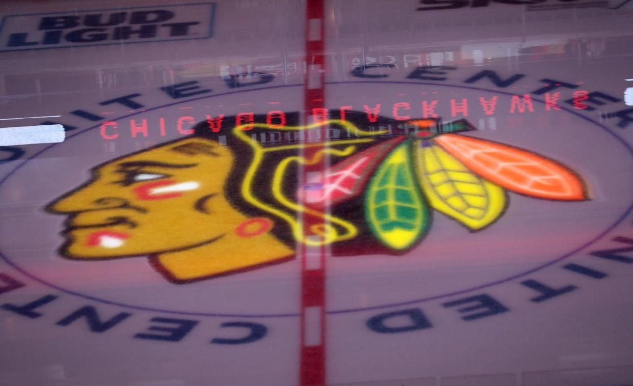 The Chicago Blackhawks logo is illuminated before a game against the Nashville Predators on April 23, 2021, at the United Center in Chicago. (John J. Kim/Chicago Tribune/Tribune News Service via Getty Images)