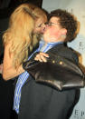 It's been a couple months since the Super Bowl, but Go Daddy nerd Jesse Heiman is still feeling the love -- only now with more tongue! "The Real Housewives of Beverly Hills" star Brandi Glanville planted one on the blushing 34-year-old at the "Pieces (of Ass)" stage production's 10th anniversary fete at Hollywood's Fonda Theater on March 28. Glanville, who was previously married to Eddie Cibrian before he moved on with LeAnn Rimes, looks ready for love as she boldly licks the character actor's closed mouth.