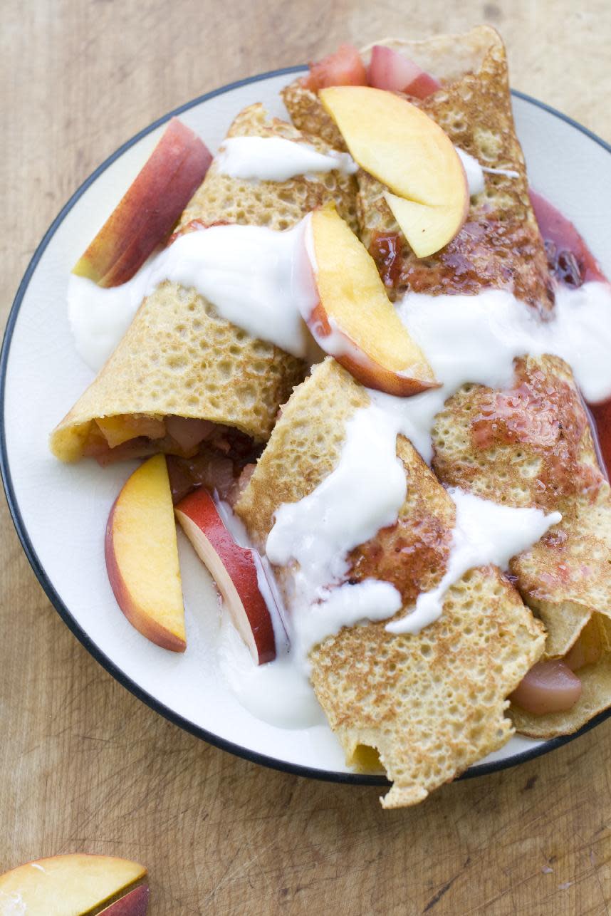 This July 8, 2013 photo shows corn crepes stuffed with summer fruits in Concord, N.H. One of the earliest French culinary imports to make a dent in America was the crepe. (AP Photo/Matthew Mead)