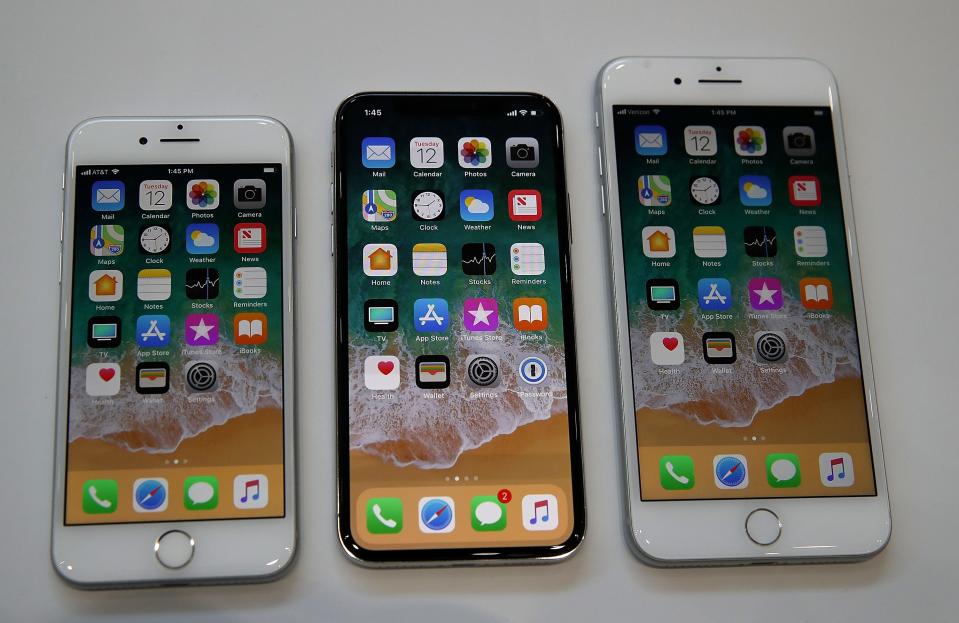 CUPERTINO, CA - SEPTEMBER 12:  (L-R) The new iPhone 8, iPhone X and iPhone 8S are displayed during an Apple special event at the Steve Jobs Theatre on the Apple Park campus on September 12, 2017 in Cupertino, California. Apple held their first special event at the new Apple Park campus where they announced the new iPhone 8, iPhone X and the Apple Watch Series 3.  (Photo by Justin Sullivan/Getty Images)