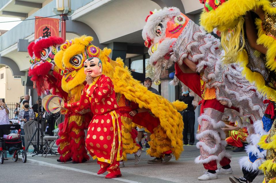 The Thien Quang Lion Dance Team performs at the Mid-Autumn Festival held at Chung Wah Lane in downtown Stockton on Saturday, Sept. 17, 2022. The celebration is the Asian observance of the fall harvest and the solstice. The event was sponsored by the Chinese Benevolent Association of Stockton, Chinese Cultural Society of Stockton, Central Valley Asian-American Chamber of Commerce, Filipino American National Historical Society and the Locke Foundation.