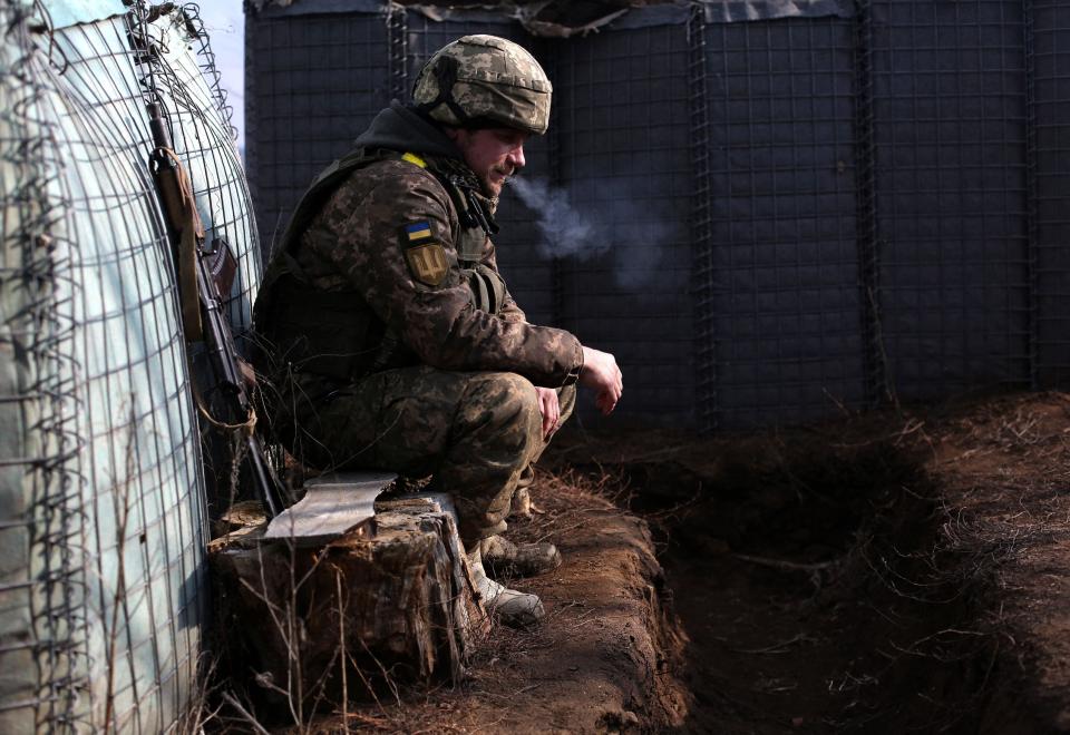 A Ukrainian serviceman on the front line with Russia-backed separatists in the Lugansk region on Feb. 22, 2022.