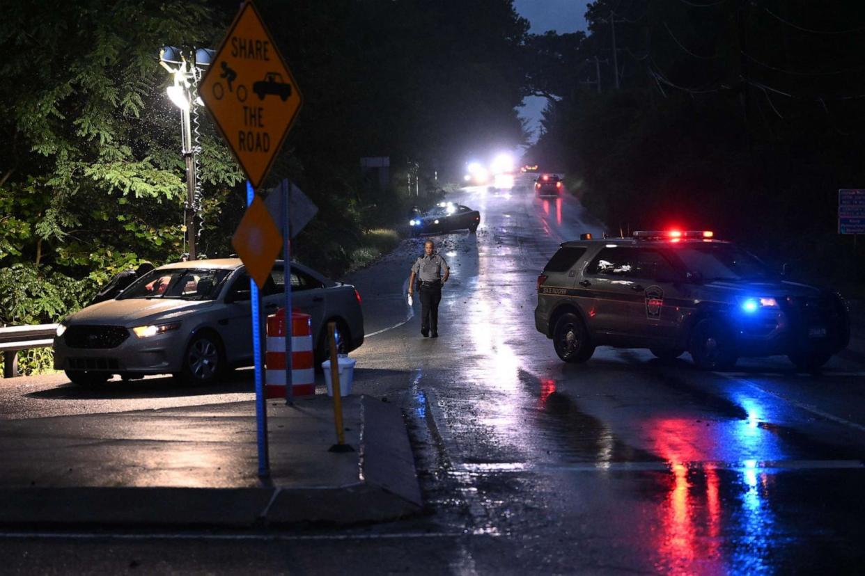 PHOTO: Police monitor a wooded perimeter in the rain on day 10 of a manhunt for convicted murderer Danelo Cavalcante on Sept. 9, 2023 in Kennett Square, Pennsylvania. Cavalcante escaped from Chester County Prison on August 31. (Mark Makela/Getty Images)