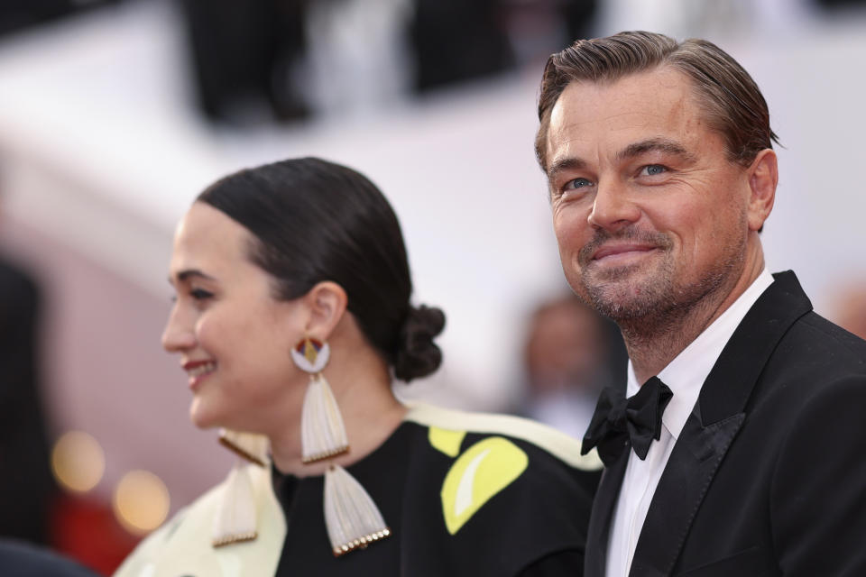 Lily Gladstone, left, and Leonardo DiCaprio pose for photographers upon arrival at the premiere of the film 'Killers of the Flower Moon' at the 76th international film festival, Cannes, southern France, Saturday, May 20, 2023. (Photo by Vianney Le Caer/Invision/AP)