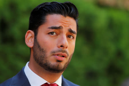 FILE PHOTO: Democratic candidate for the 50th congressional district Ammar Campa Najjar makes an appearance outside federal court where incumbent Duncan Hunter (R-CA) and his wife were being arraigned in San Diego, California, U.S. August 23, 2018. REUTERS/Mike Blake/File Photo