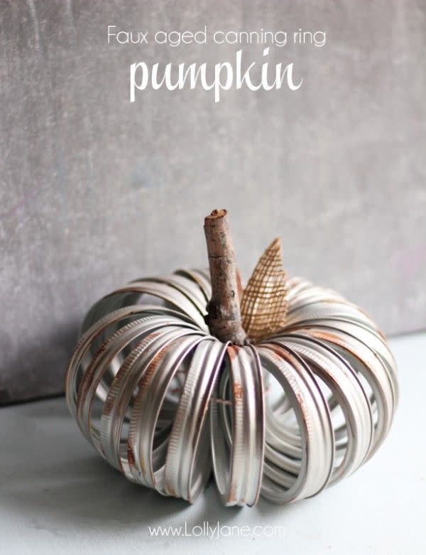 <p>Make a new canning-ring pumpkin look vintage with brown and orange acrylic paint and sandpaper.</p><p><strong>Get the tutorial at <a href="http://lollyjane.com/faux-aged-canning-ring-pumpkin/" rel="nofollow noopener" target="_blank" data-ylk="slk:Lolly Jane;elm:context_link;itc:0;sec:content-canvas" class="link ">Lolly Jane</a>.</strong> </p>