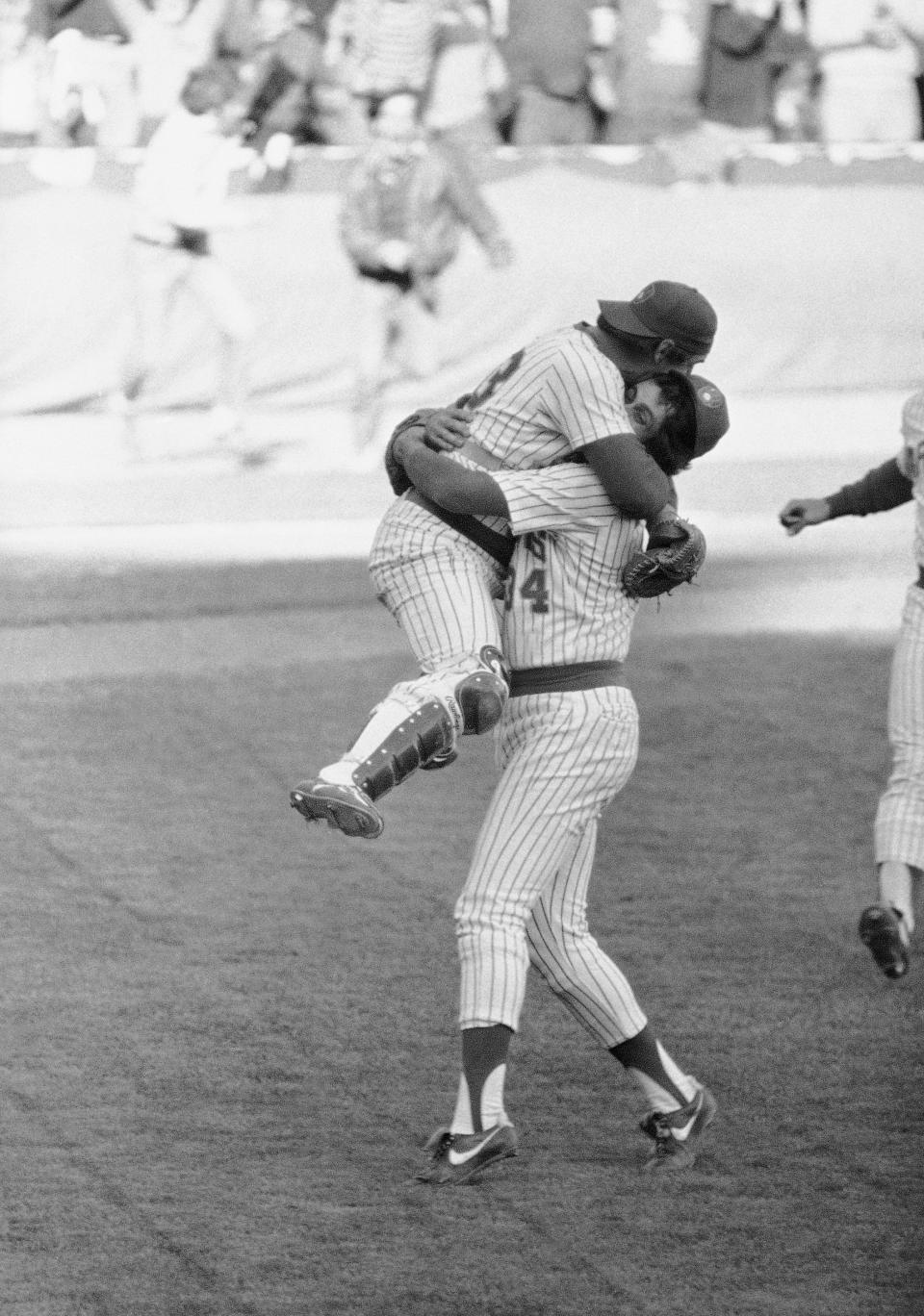 Brewers reliever Rollie Fingers carries catcher Ted Simmons following Milwaukee's 2-1 victory over Detroit to take the American League East second-half championship on Oct. 3, 1981, at Milwaukee's County Stadium.