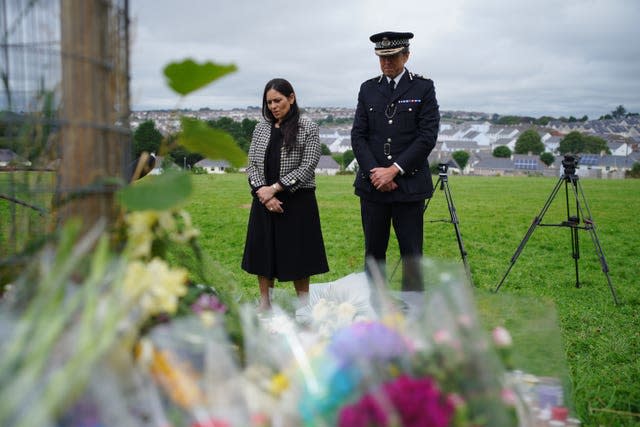 Home Secretary Priti Patel and Chief Constable of Devon and Cornwall Police, Shaun Sawyer, visiting tributes to the Keyham victims