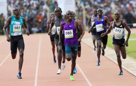 Athletics - Rio 2016 Olympic Games - Men's 800 meter trials - Eldoret, Kenya - 1/7/16 - Alfred Kipketer (C) competes against David Rudisha (083) and Nicholas Koech (092). REUTERS/Thomas Mukoya