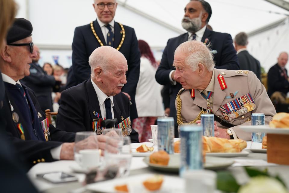 King Charles III speaks with D-Day veteran Arnie Salter, 98, from Warwickshire (Gareth Fuller/PA Wire)