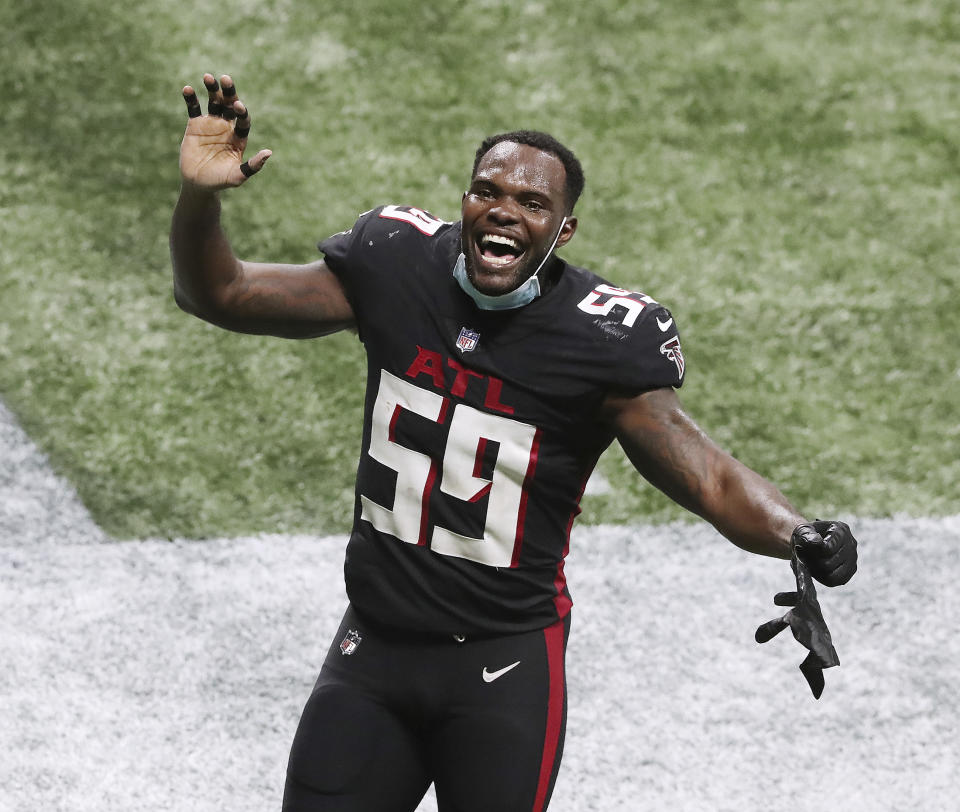 Atlanta Falcons linebacker LaRoy Reynolds celebrates a victory over the Las Vegas Raiders during the fourth quarter of an NFL football game on Sunday, Nov 29, 2020, in Atlanta. (Curtis Compton/Atlanta Journal-Constitution via AP)