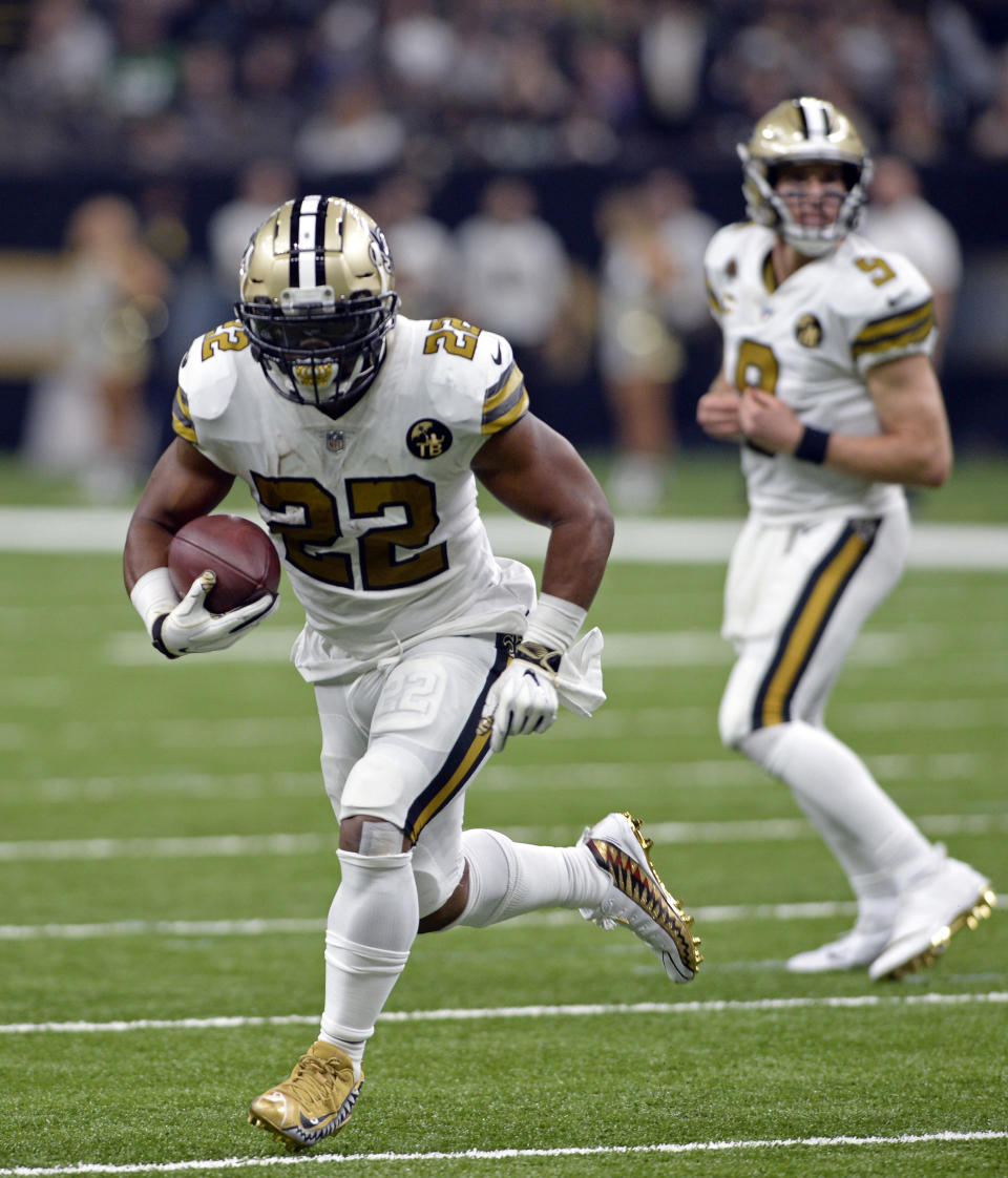 New Orleans Saints running back Mark Ingram (22) carries for a touchdown in the first half of an NFL football game against the Philadelphia Eagles in New Orleans, Sunday, Nov. 18, 2018. (AP Photo/Bill Feig)