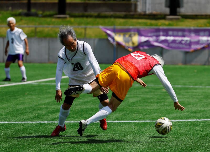 FILE PHOTO: The Wider Image: For Japan's ageing soccer players, 80 is the new 50