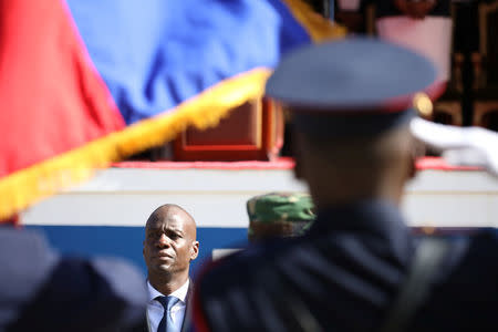 Haitian President Jovenel Moise is seen during the national anthem of Haiti before a parade of the Haitian Armed Forces (FAD'H) in the streets of Cap-Haitien, Haiti, November 18, 2017. REUTERS/Andres Martinez Casares