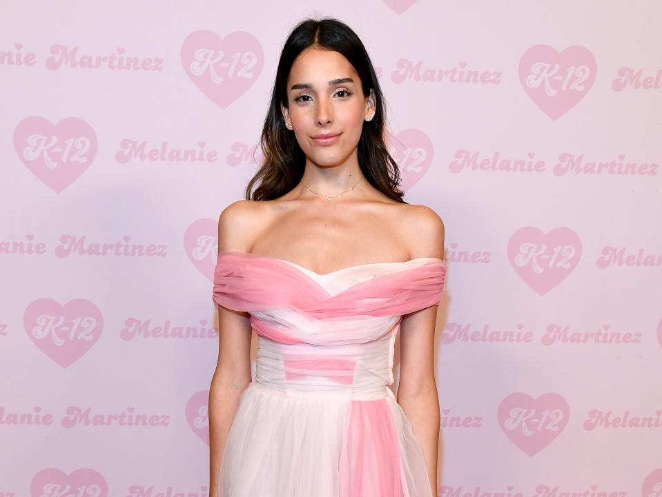 zion moreno wearing pink and white dress at the melanie martinez "K-12" film premiere