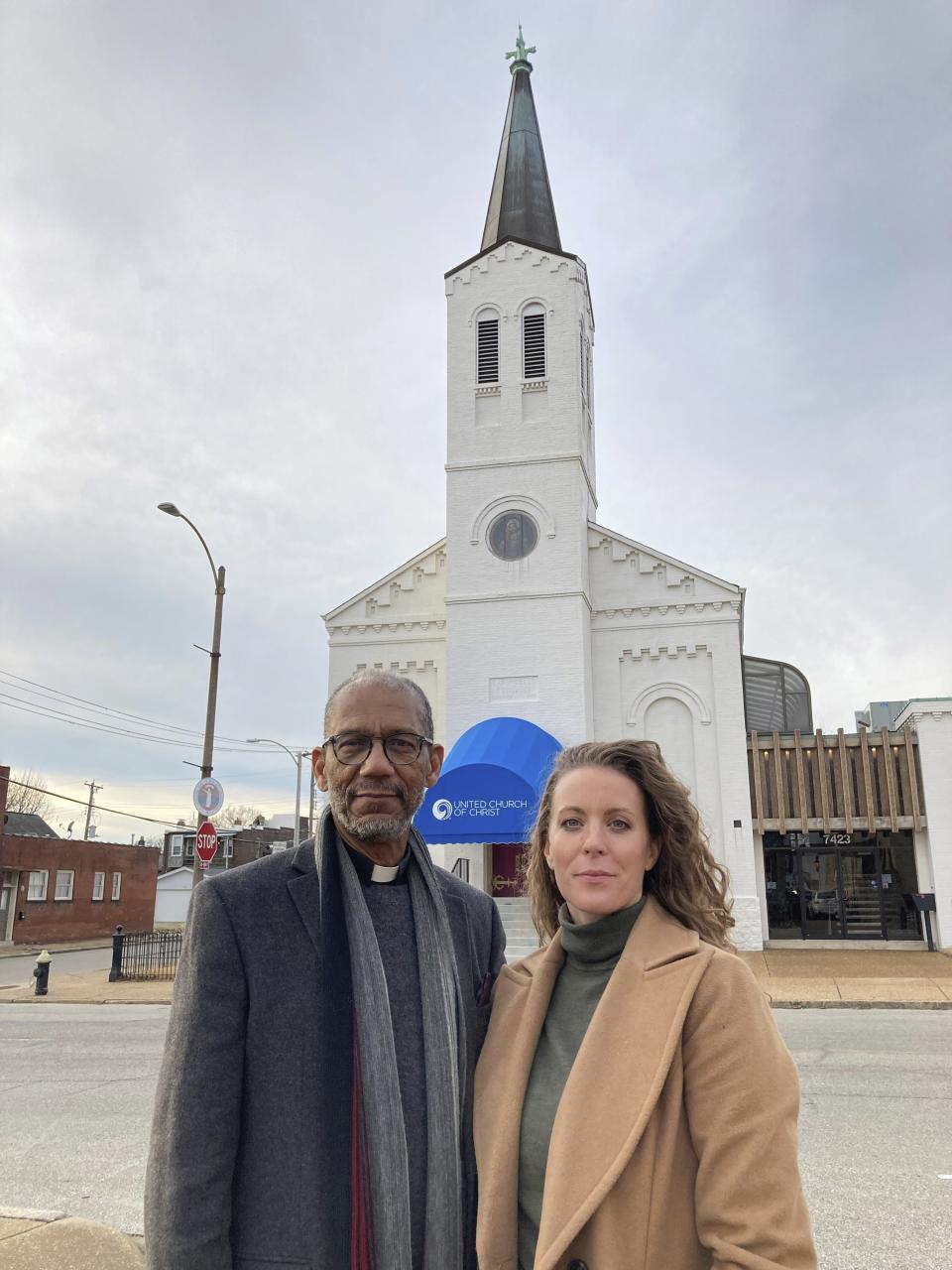 The Rev. Darryl Gray and the Rev. Lauren Bennett stand in front of Bennett's church, Metropolitan Community Church of Greater St. Louis, on Jan. 10, 2023, in St. Louis, Mo. Both served as spiritual advisers at recent executions in Missouri, sitting alongside the inmates and touching them as the process occurred. Spiritual advisers have been increasingly present during executions since a Supreme Court ruling last year. (AP Photo/Jim Salter)