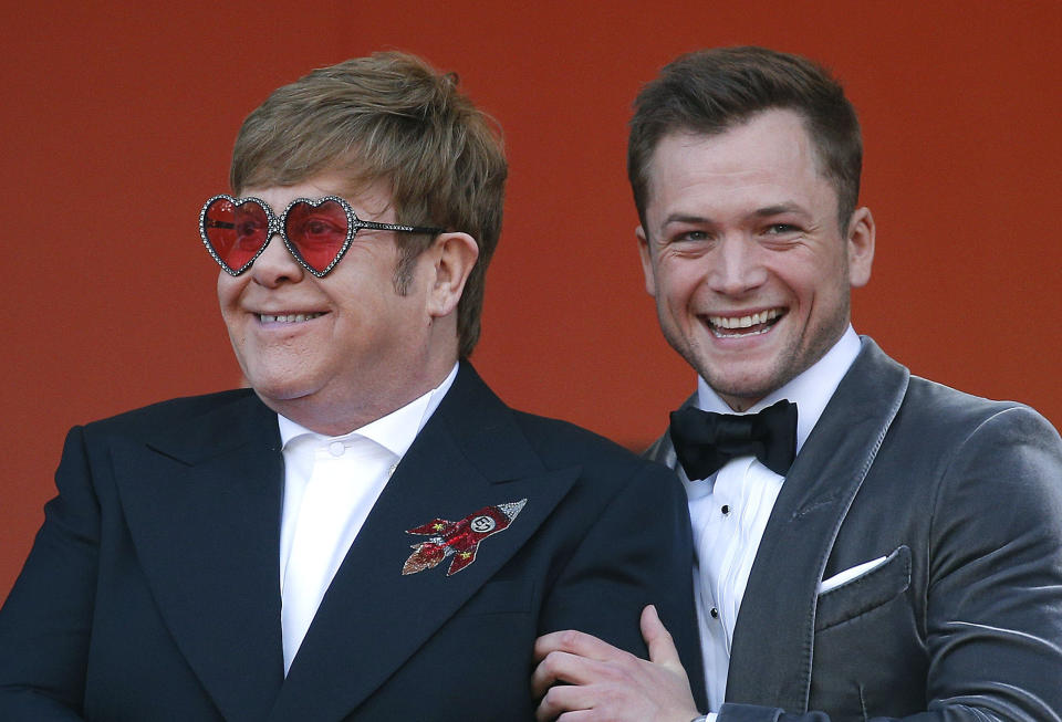 72nd Cannes Film Festival - Screening of the film "Rocketman" out of competition - Red Carpet Arrivals - Cannes, France, May 16, 2019. Elton John poses with Taron Egerton. REUTERS/Stephane Mahe