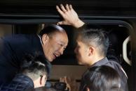 FILE PHOTO: Opposition Kuomintang Party (KMT) presidential candidate Han Kuo-yu leaves after voting at a polling station during general elections in Kaohsiung