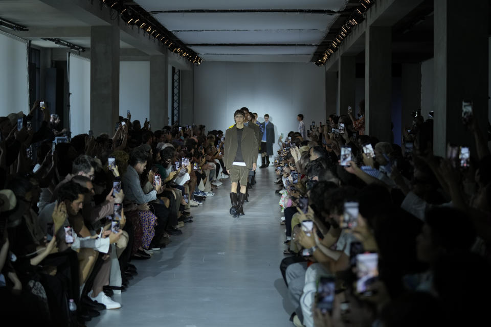 Models wear creations as part of the Neil Barret men's Spring Summer 2024 collection presented in Milan, Italy, Saturday, June 17, 2023. (AP Photo/Antonio Calanni)