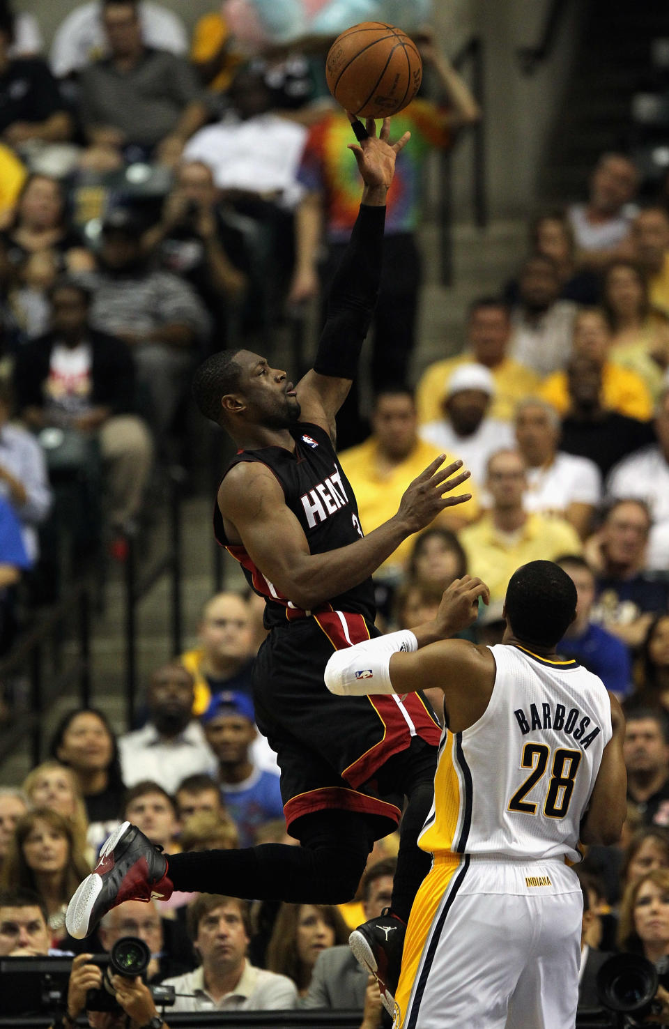 INDIANAPOLIS, IN - MAY 20: Dwyane Wade #3 of the Miami Heat shoots over Leandro Barbosa #28 of the Indiana Pacers in Game Four of the Eastern Conference Semifinals in the 2012 NBA Playoffs at Bankers Life Fieldhouse on May 20, 2012 in Indianapolis, Indiana. NOTE TO USER: User expressly acknowledges and agrees that, by downloading and/or using this photograph, User is consenting to the terms and conditions of the Getty Images License Agreement. (Photo by Jonathan Daniel/Getty Images)