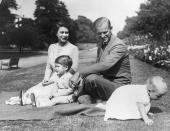 <p>The Queen spends some much-deserved free time with her young family in 1951 on the grounds of Clarence House in London. </p>
