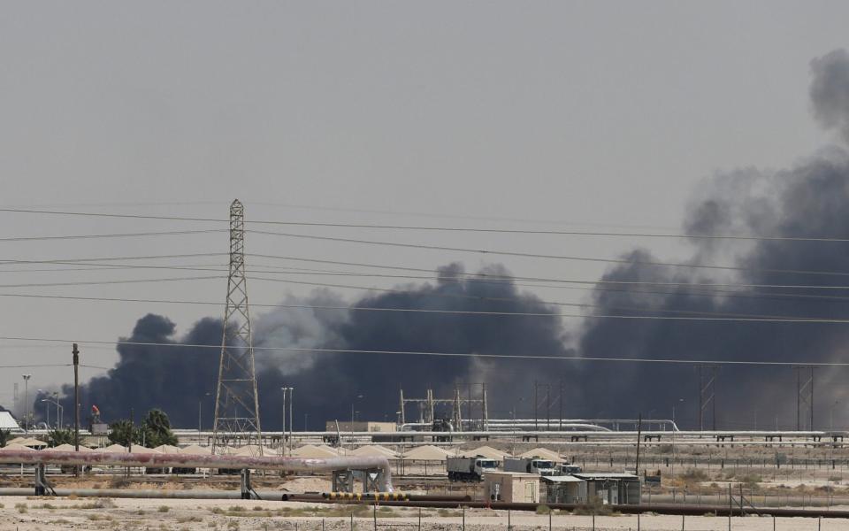 Smoke is seen following a fire at Aramco facility in the eastern city of Abqaiq - REUTERS