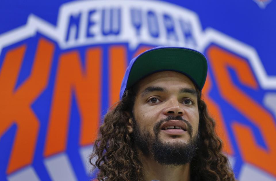 Joakim Noah answers questions during a news conference at the Knicks' training facility on July 8, 2016. (AP)