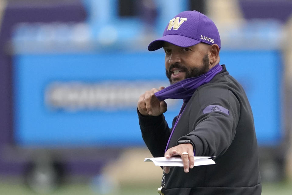 Washington head coach Jimmy Lake gives instructions during NCAA college football practice, Friday, Oct. 16, 2020, in Seattle. (AP Photo/Ted S. Warren)