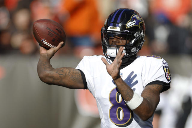 Lamar Jackson at voluntary practice for Ravens after skipping last year's