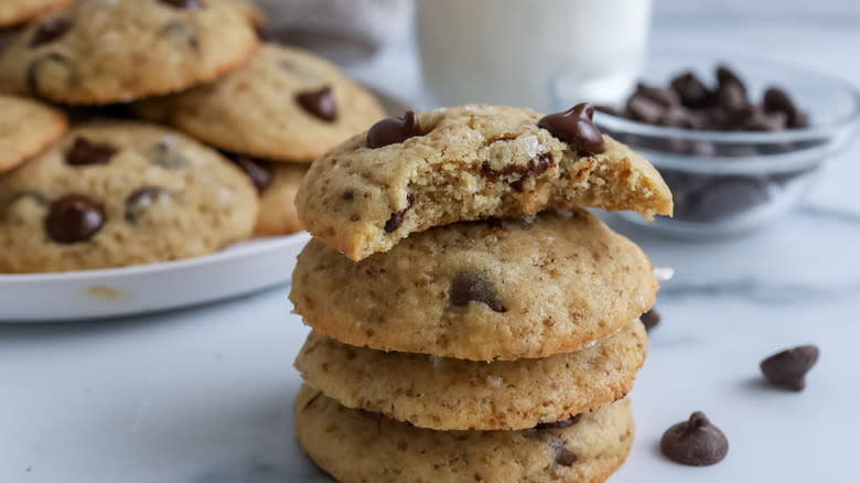 Chocolate chip quinoa cookies stacked on a table