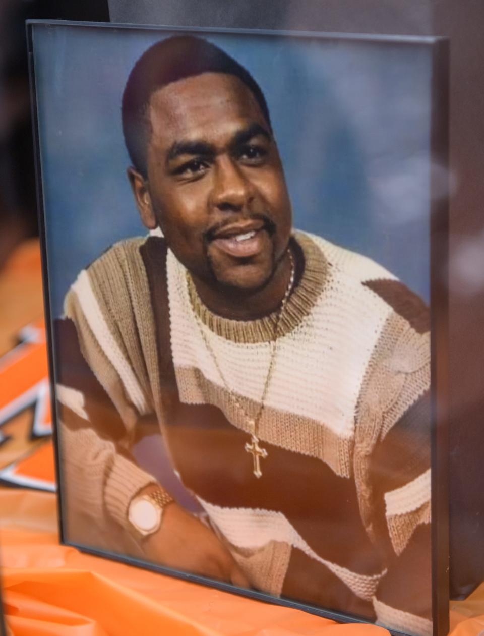 A portrait of Courtland Tubbs from his senior year at Manual High School in on display in a case of memorabilia from the star athlete at the school.