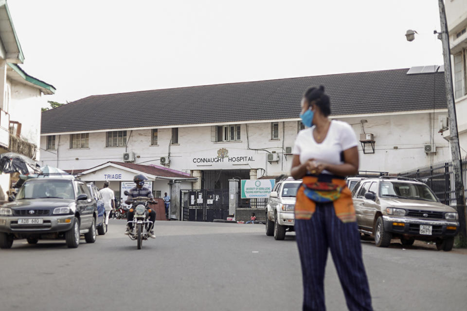 The Connaught Hospital is seen in the capital Freetown, Sierra Leone Friday, May 8, 2020. Despite the loss of colleagues, Dr. Mamadu Baldeh, one of only four physicians managing the COVID-19 unit at the hospital, is fighting not only to save his coronavirus patients but also to provide quality care for those afflicted with other infectious diseases as he and other health care workers fight for a better system. (Vicki Remoe/VRC Marketing via AP)