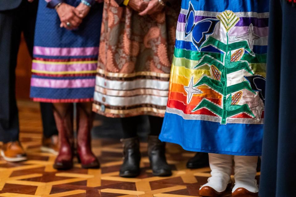 Deb Haaland and her guests wear indigenous clothing as they attend Haaland’s swearing-in ceremony as Secretary of the Interior Thursday, March 18, 2021, in the Vice President’s Ceremonial Office in the Eisenhower Executive Office Building at the White House