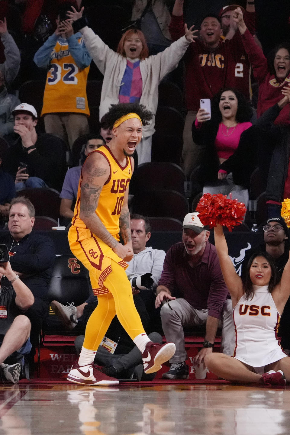 Southern California forward DJ Rodman after scoring with seconds left reacts during the second half of an NCAA college basketball game against Utah Thursday, Feb. 15, 2024, in Los Angeles. (AP Photo/Mark J. Terrill)