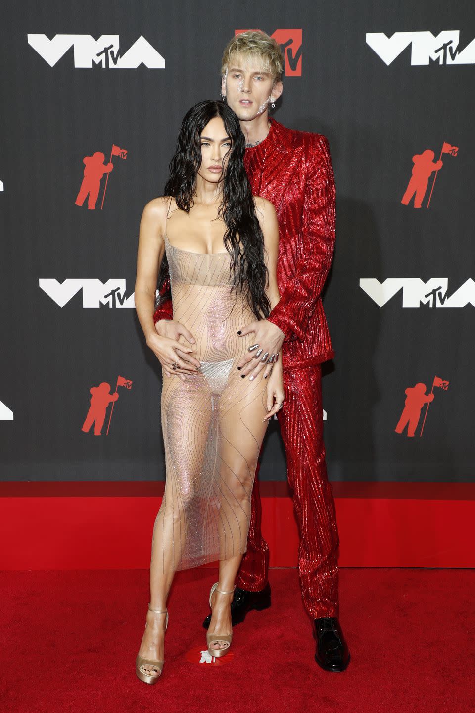 9) Machine Gun Kelly in Dolce & Gabbana Alta Sartoria and Megan Fox in Mugler