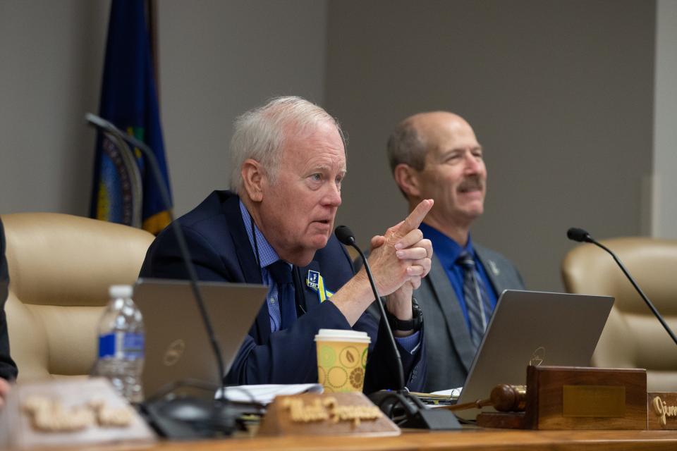 Kansas State Board of Education chairman Jim Porter, asks a question to Raphael Wahwassuck, a member of the Prairie Band Potawatomi Nation tribal council, during Wednesday's meeting.