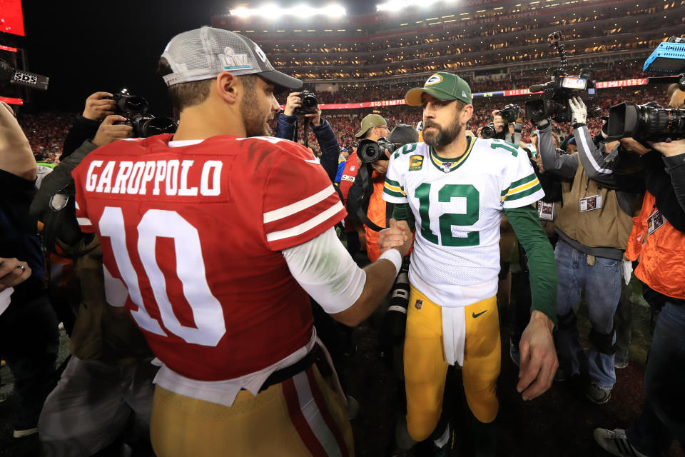 SANTA CLARA, CALIFORNIA - JANUARY 19: Jimmy Garoppolo #10 of the San Francisco 49ers shakes hands with Aaron Rodgers #12 of the Green Bay Packers after winning the NFC Championship game at Levi's Stadium on January 19, 2020 in Santa Clara, California. The 49ers beat the Packers 37-20. (Photo by Sean M. Haffey/Getty Images)