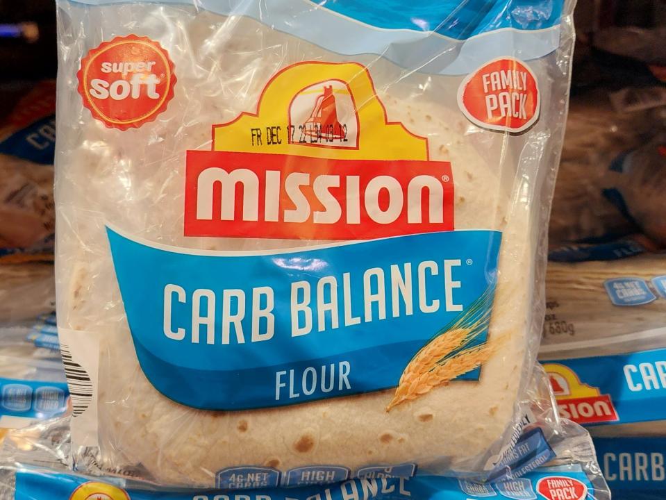The writer holds a package of Mission carb-balance flour tortillas