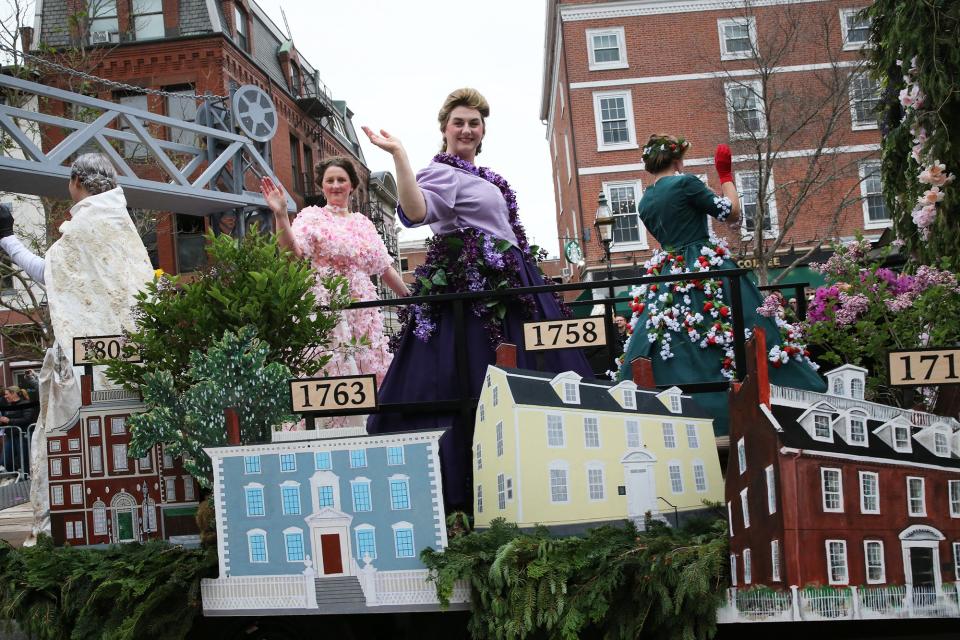 The Portsmouth NH 400 float, called “History in Bloom, an ode to the preservation of Portsmouth’s natural and architectural beauty, 1623 to 2023 and beyond," enters Market Square during the city's 400th anniversary parade Saturday, June 3, 2023.